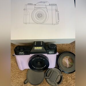 Beginner 4k digital camera/camcorder purple. Slightly used 👍🏽 condition.